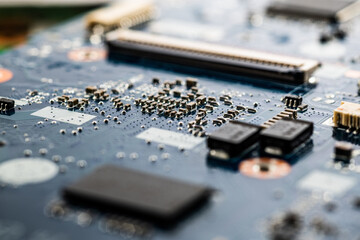 Close-up printed circuit board with electronics components. Macro photography for electric...