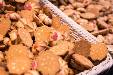 crispy cookies in wicker baskets on the counter