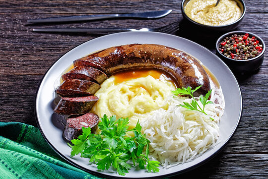 German food: blutwurst with potato and sauerkraut