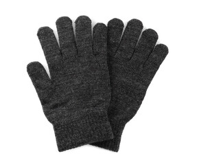 Grey woolen gloves on white background, top view. Winter clothes