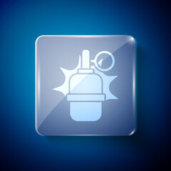 White Hand grenade icon isolated on blue background. Bomb explosion. Square glass panels. Vector.