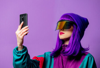 Style woman in VR glasses and 80s tracksuit with mobile phone