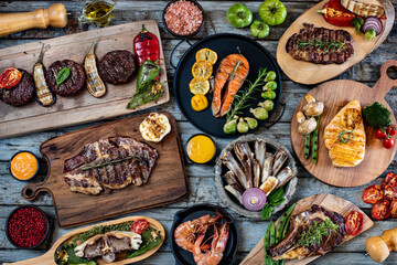 Different kinds of grilled meat on the table at the restaurant