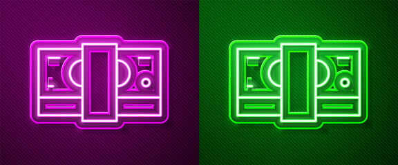 Glowing neon line Stacks paper money cash icon isolated on purple and green background. Money banknotes stacks. Bill currency. Vector.