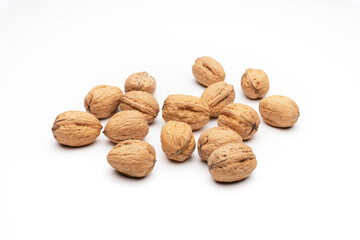 Various walnuts on white background