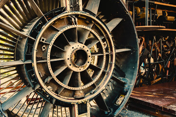 The old machinery part of the plane has been dropped in the scrap shop.