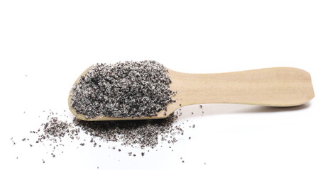 Ground poppy seeds in wooden spoon isolated on white background