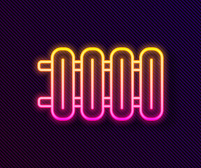 Glowing neon line Heating radiator icon isolated on black background. Vector.