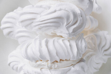 Meringue. Sweet meringues. Meringue tray. Close up photo of meringues. Dessert Background.