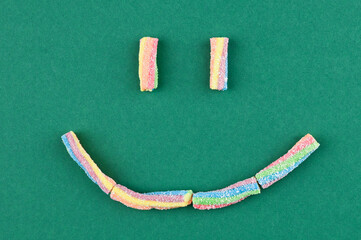Gummy candies in the shape of a smile.