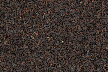 Dry black tea leaves. Tea ceremony concept. Space for text.