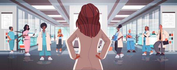 team of mix race doctors in uniform discussing during meeting in hospital corridor medicine healthcare concept horizontal full length vector illustration