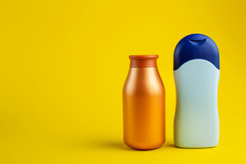 Cosmetics containers mockup. Two Jar  for cosmetic product on a yellow background. Beauty products for body care.