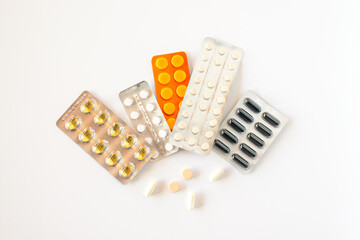 Packs of pills on white background