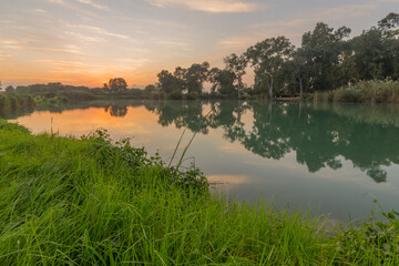 Obraz premium Sunset view of the lake, in Yarkon (Tel-Afek) National Park