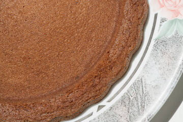 brown textured freshly baked sponge cake crust