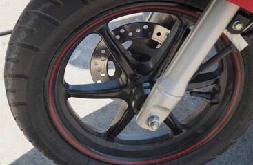 Obraz na płótnie Canvas Front wheel of a motorcycle