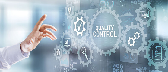 Quality control assurance standard iso business technology industrial concept. Businessman pressing...