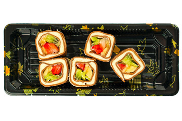 Japanese, Chinese rolls, sushi, sashimi on a plastic substrate, isolated on a white background.