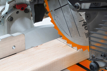 lining up the cut with a miter saw