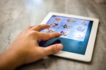 A blurred background view of the current coffee shop menu ordering by customers to select through the tap and click order, modern technology and ease of use.