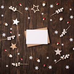 Christmas letter to Santa mockup with craft envelope. Festive dark wooden background.
