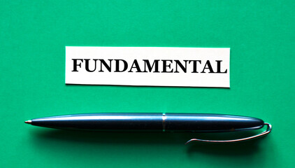 FUNDAMENTAL - word on a green background with a black handle