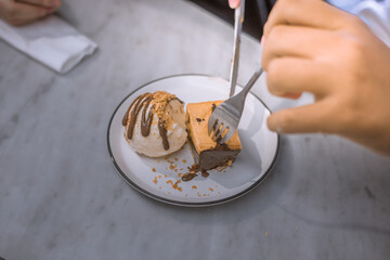 Blurred background view Of the dessert menu (Honey Toast) that contains ice cream, whipped cream, sour fruit like strawberries to be decorated and served to the customer.