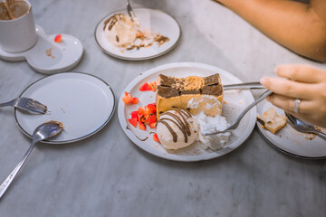 Blurred background view Of the dessert menu (Honey Toast) that contains ice cream, whipped cream, sour fruit like strawberries to be decorated and served to the customer.