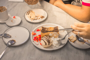 Blurred background view Of the dessert menu (Honey Toast) that contains ice cream, whipped cream, sour fruit like strawberries to be decorated and served to the customer.