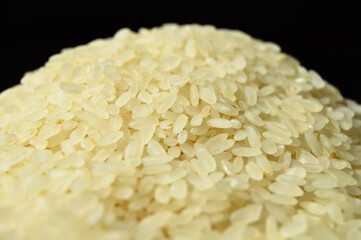 Fresh organic white raw rice grains texture, uncooked rice background