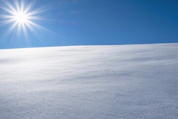 Winter background with snow, sun and blue sky. Sunny day in winter