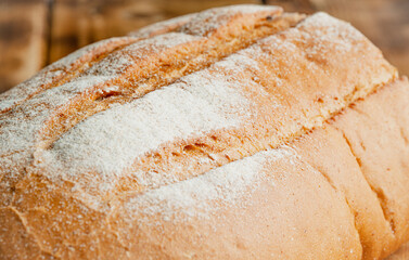 wheat bread on a wooden table