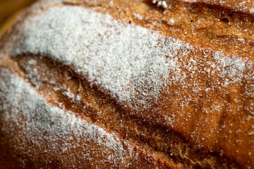 wheat bread on a wooden table