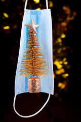 image of fir tree mask dark background