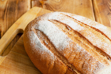 wheat bread on a wooden table