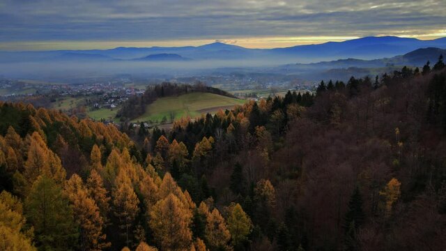 Aerial shot of mountains meadow in Beskidy with Babia G&oacute;ra in background.