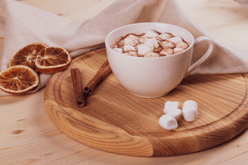 tasty sweet hot chocolate in a cup and mini marshmallows