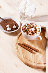 tasty sweet hot chocolate in a cup and mini marshmallows