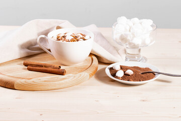 tasty sweet hot chocolate in a cup and mini marshmallows
