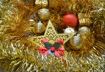 Christmas frame. Christmas balls, garland, red and golden decorations on white background. Flat lay, top view, copy space