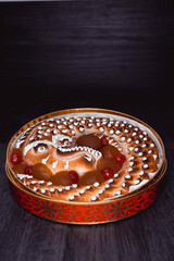 The eel, famous Christmas candy from Toledo, Spain, made with marzipan, yolk, and angel hair.