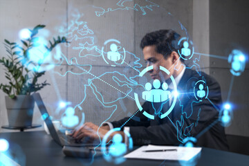 Businessman in office working with laptop, develop networking chain to push new social media...