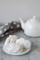 Obraz na płótnie Canvas Meringue. Sweet meringues. Meringue tray. Close up photo of meringues. 