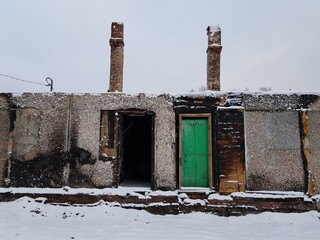 Remains of a burnt down residential building