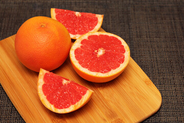 Fototapeta na wymiar grapefruit on wooden background
