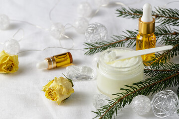 Fototapeta na wymiar Natural cold pressed Shea butter for skin care of the face and body. Christmas winter gift card 