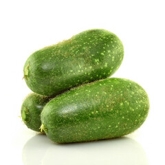 Three green zucchini(hairy squash) on a white background