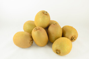 A pile of kiwifruits on white background.
