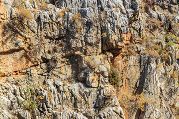 Natural texture of a mountain cliff rock for background